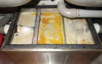 grease trap before cleaning
